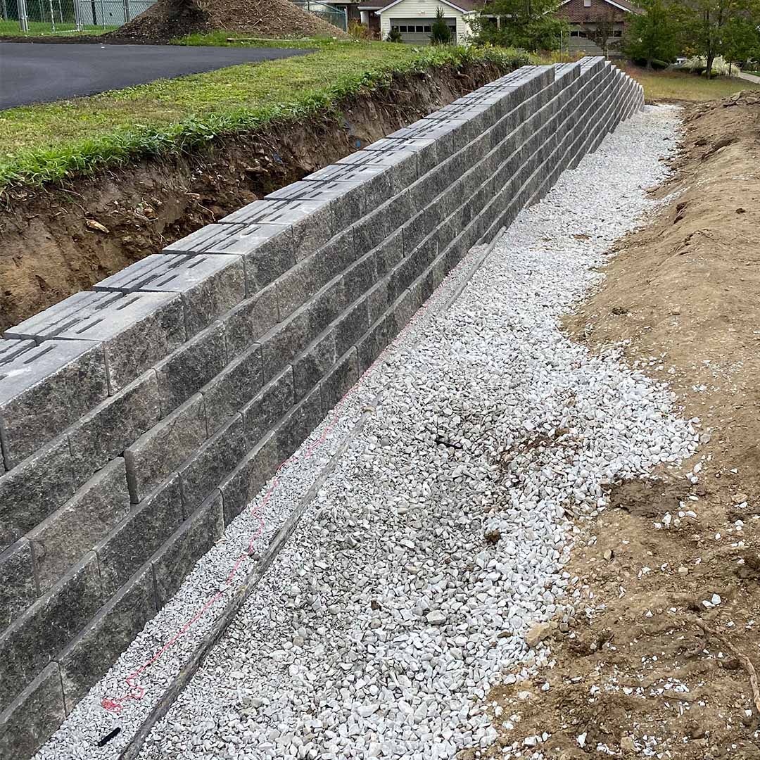 A long retaining wall in a Pittsburgh landscape