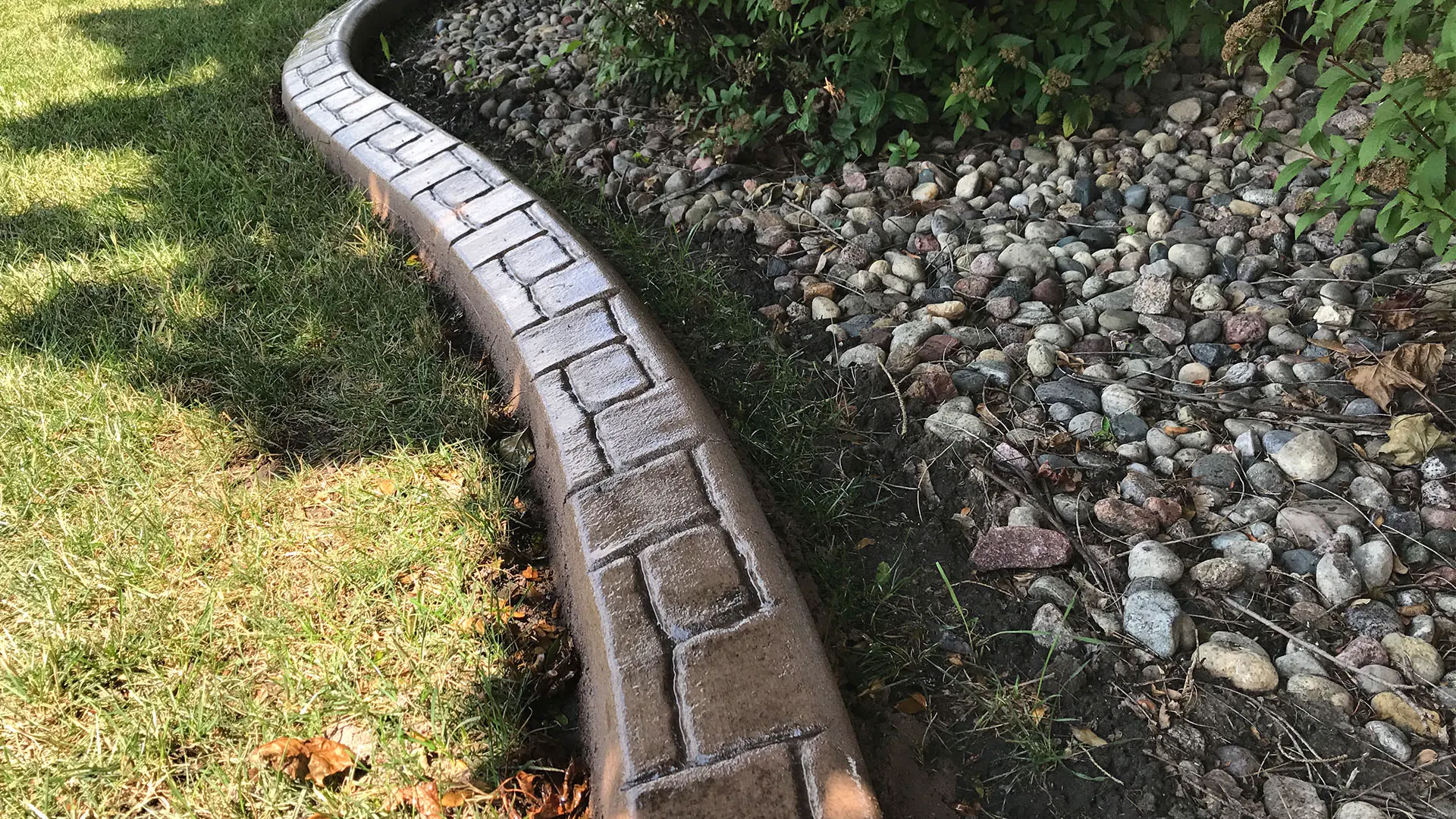 Castle rock concrete curbing style with natural stone texture