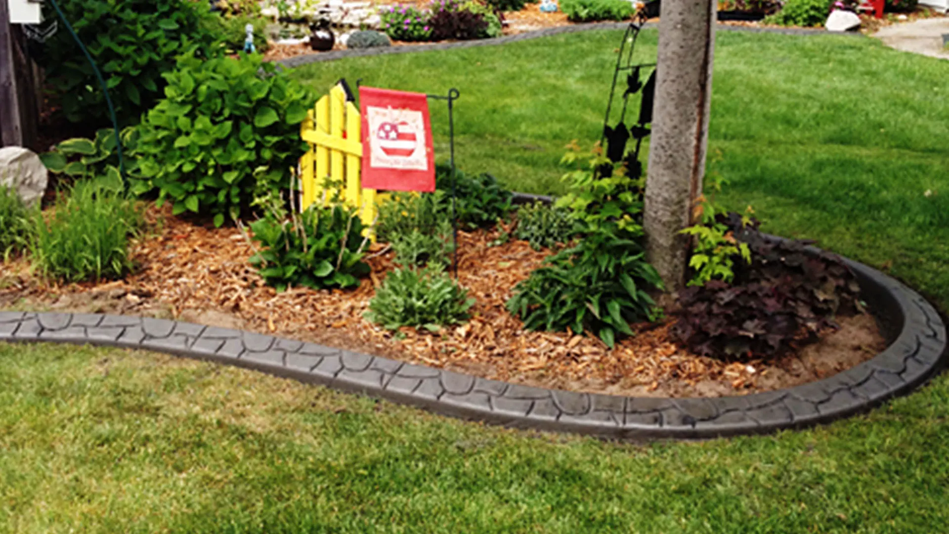 Flagstone concrete curbing style with natural stone look