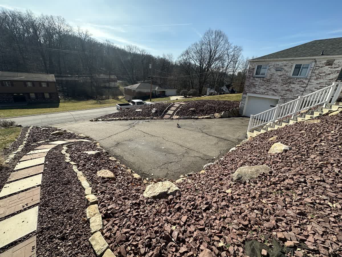 Old asphalt driveway before replacement in Pleasant Hills