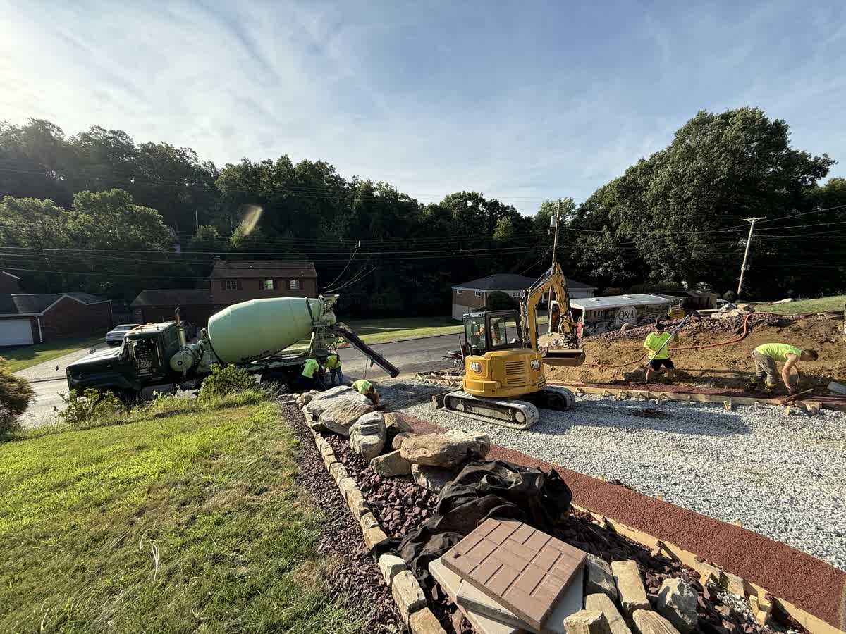 Concrete being poured for new driveway installation in Pleasant Hills