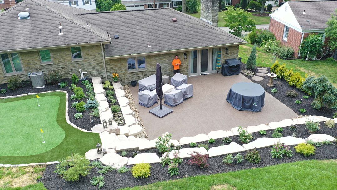 Exposed aggregate patio and outcropping walls in Bethel Park