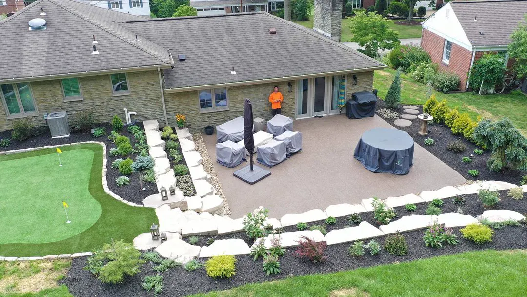 Exposed aggregate patio and outcropping walls in Bethel Park
